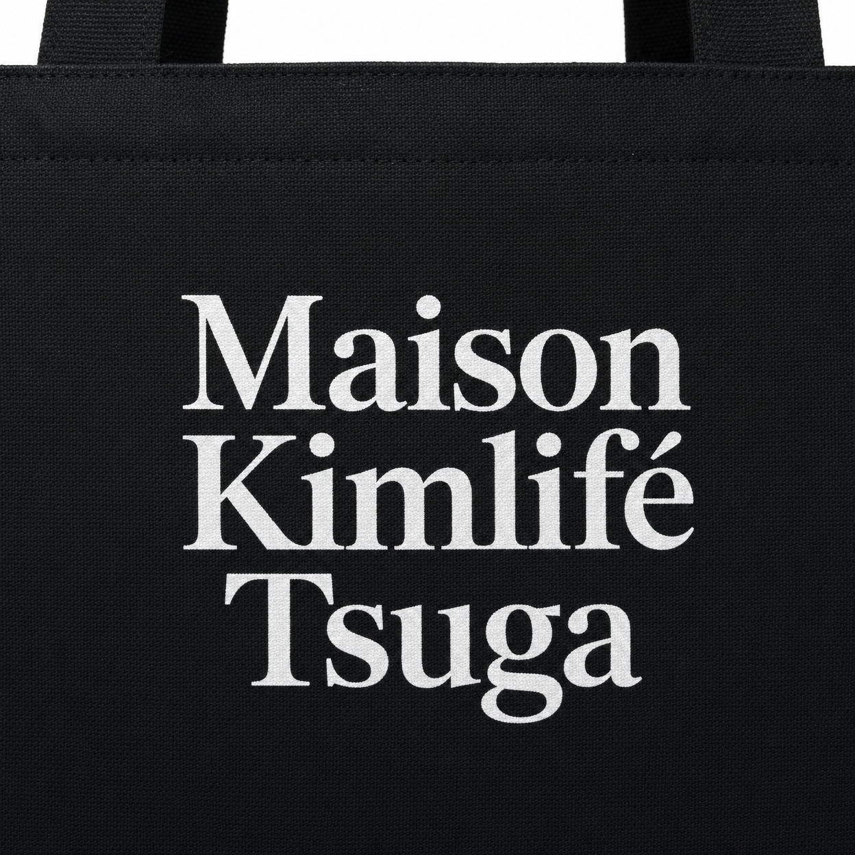 Black Tote Bag — logo detail