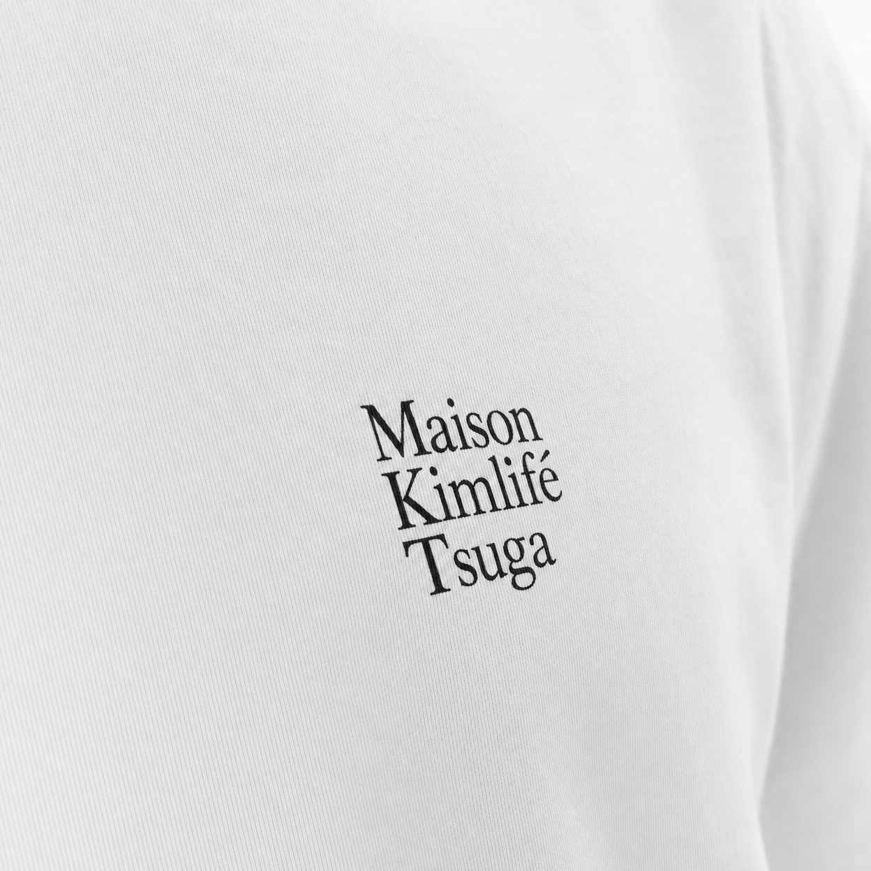 White Tee — logo detail