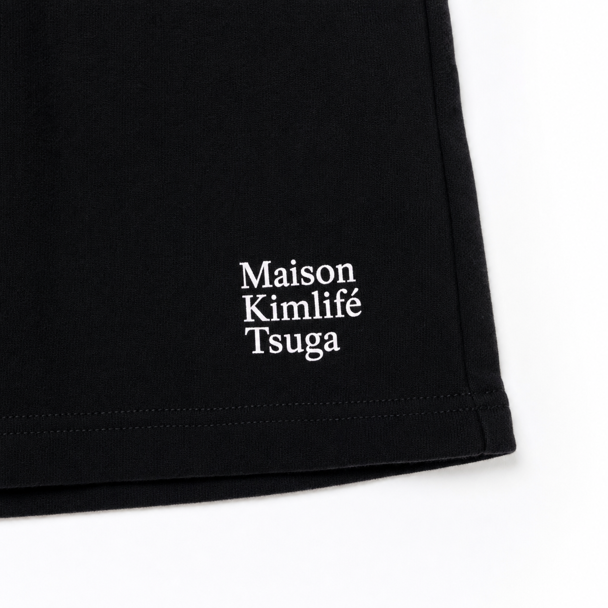 Black Sweat Shorts — logo detail