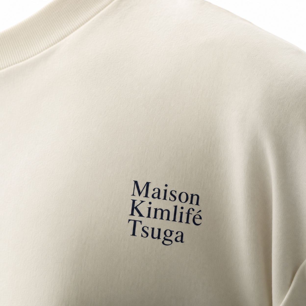 Cream Tee — logo detail